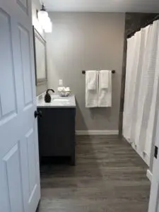 A washroom with a white color towel