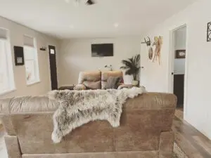 Beautiful living area with a white rug